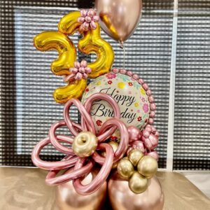 rose-gold-gold-milestone-birthday-balloon-bouquet